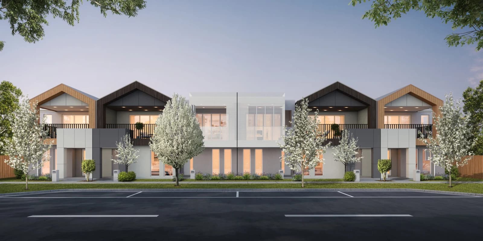 Row of townhouses with pitched roofs and front gardens in Pakenham, Melbourne