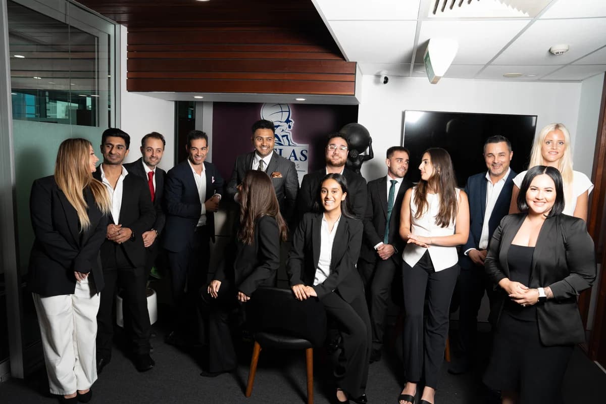 Atlas Business Group team together in the office