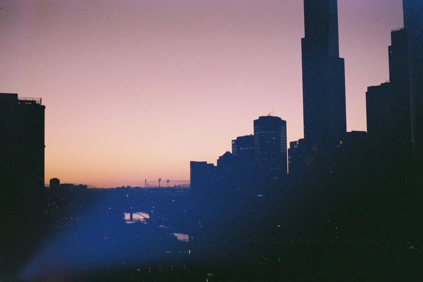 Melbourne skyline at sunset over the Yarra River