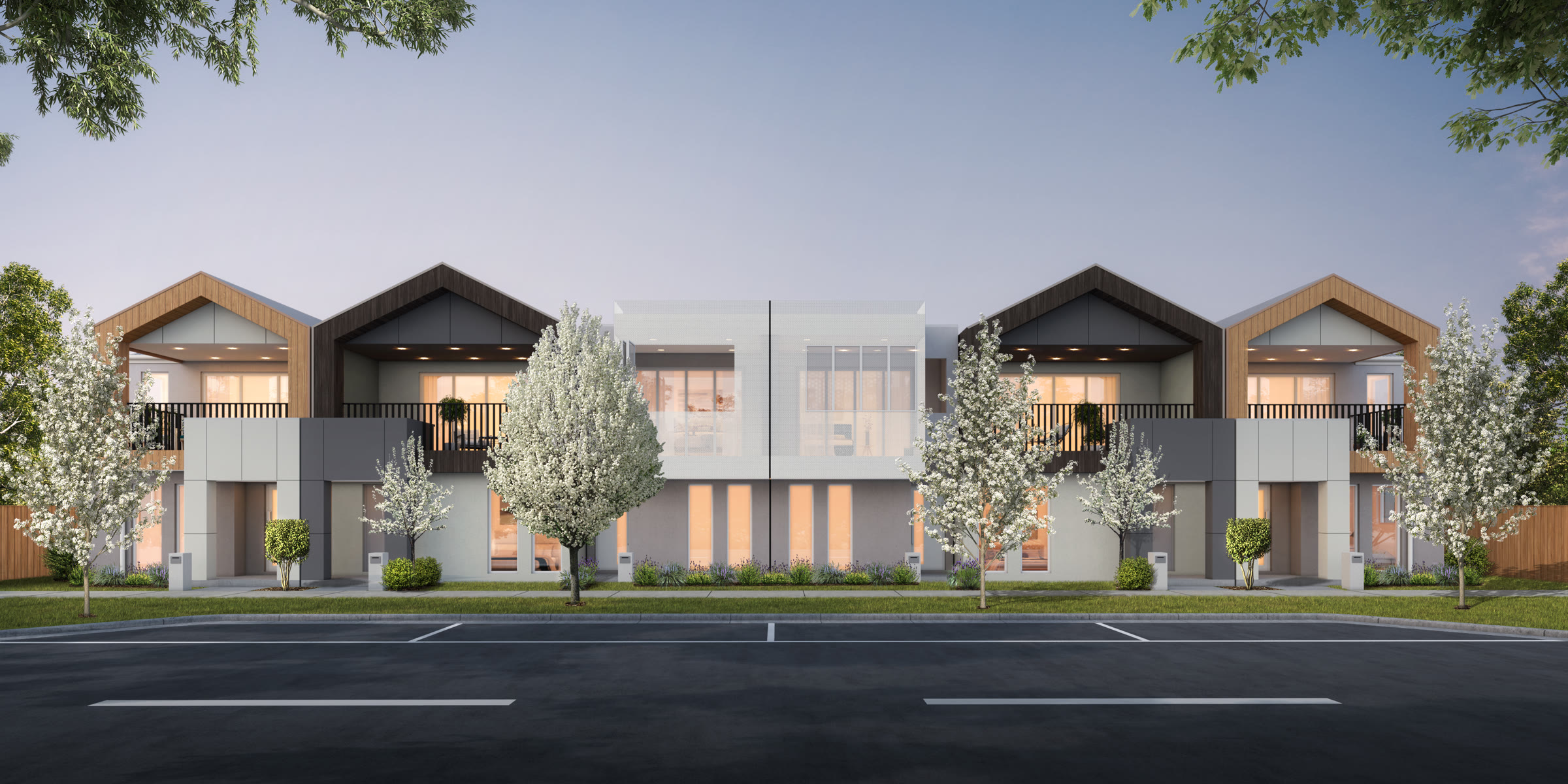 Row of townhouses with pitched roofs and front gardens in Pakenham, Melbourne